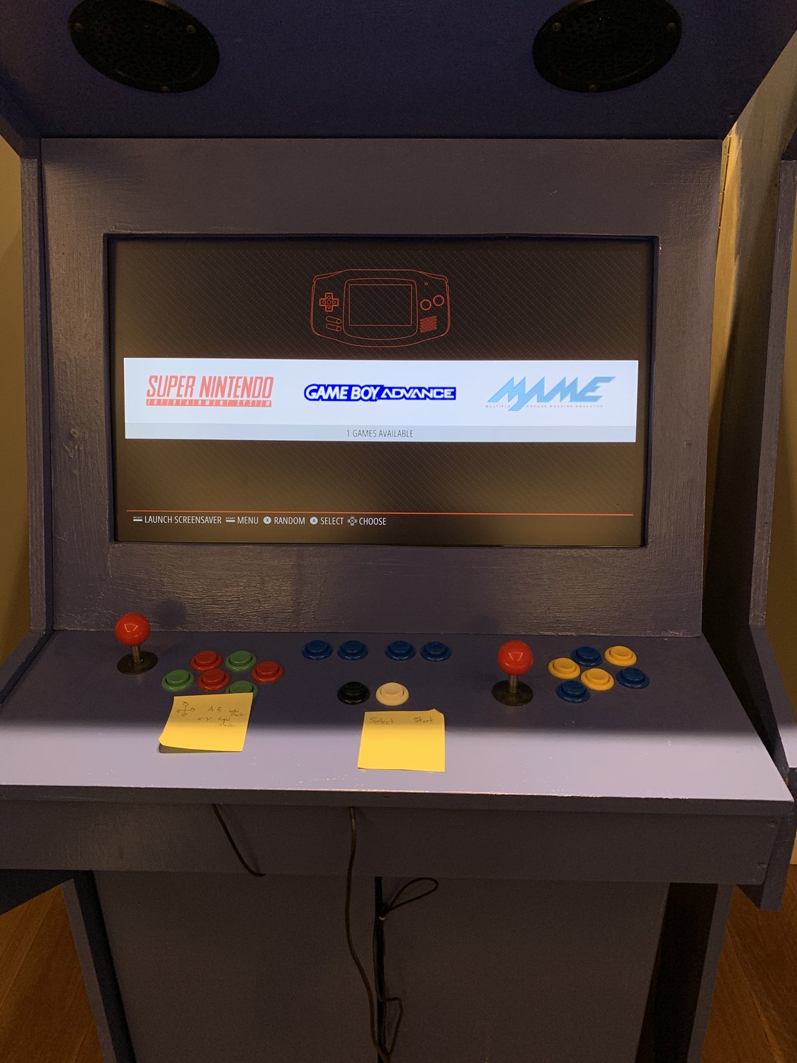 The cabinet's control panel and multi-system emulator menu