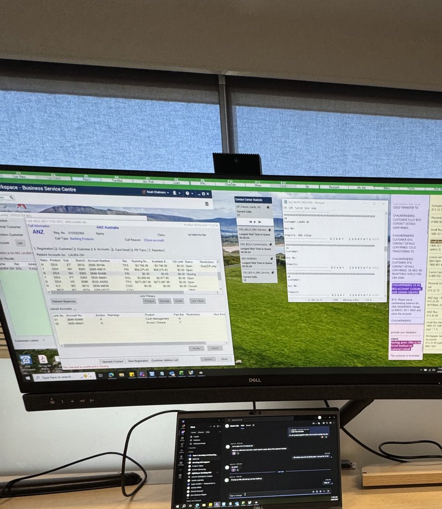 Noah's dual-screen desk setup at the ANZ office