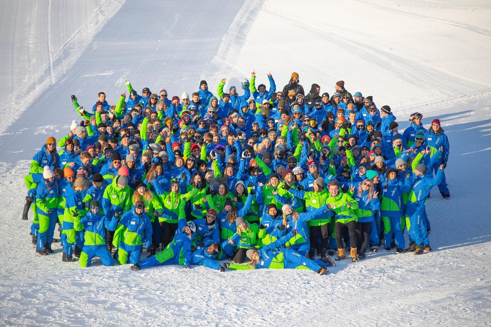 Noah with the full GoSnow ski-school team gathered on the snow in Niseko, Japan